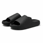 Black EVA platform slide slippers front view on white