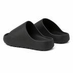 Black EVA platform slide slippers rear view on white