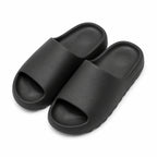 Black EVA platform slide slippers top view on white
