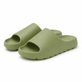 Green EVA platform slide slippers on a white background