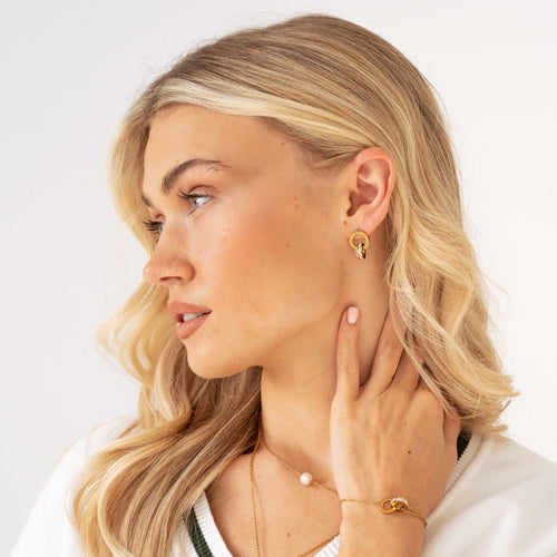 Bruce & Co Camila – Interlocking Roman Ring Stud Earrings