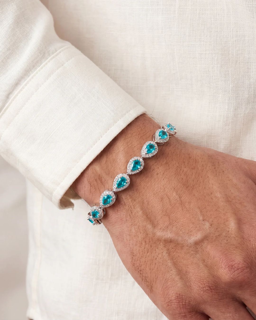 Bruce & Co Turquoise-Color Zirconia Teardrop Bracelet, Silver-Tone