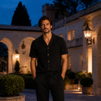 Avedane black summer set styled in a hotel courtyard