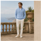 Blue Avesaro half-zip pullover styled on a Mediterranean terrace
