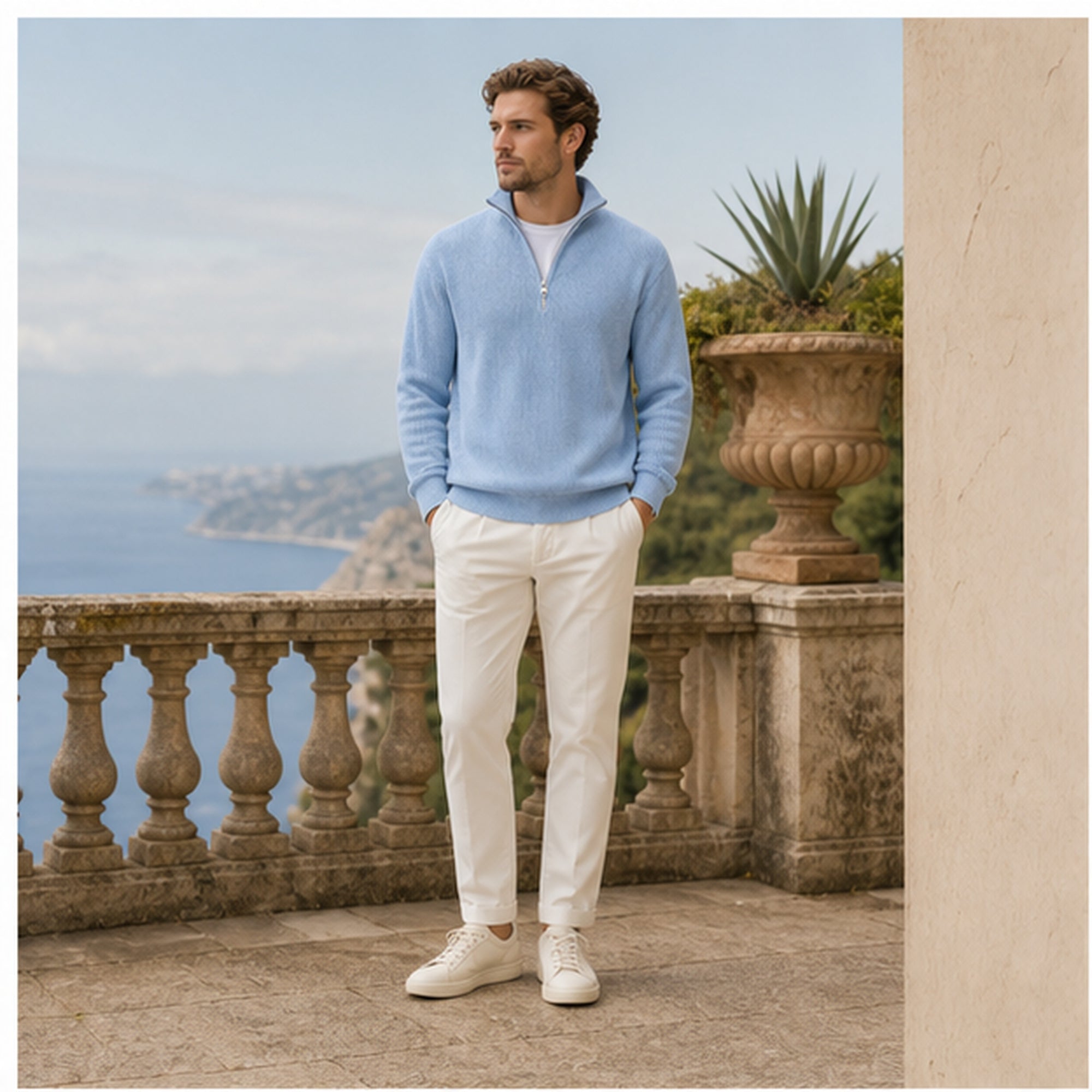 Blue Avesaro half-zip pullover styled on a Mediterranean terrace
