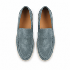 Bellaro petrol-blue suede loafers, top view on white