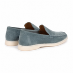 Bellaro petrol-blue suede loafers, rear three-quarter view on white
