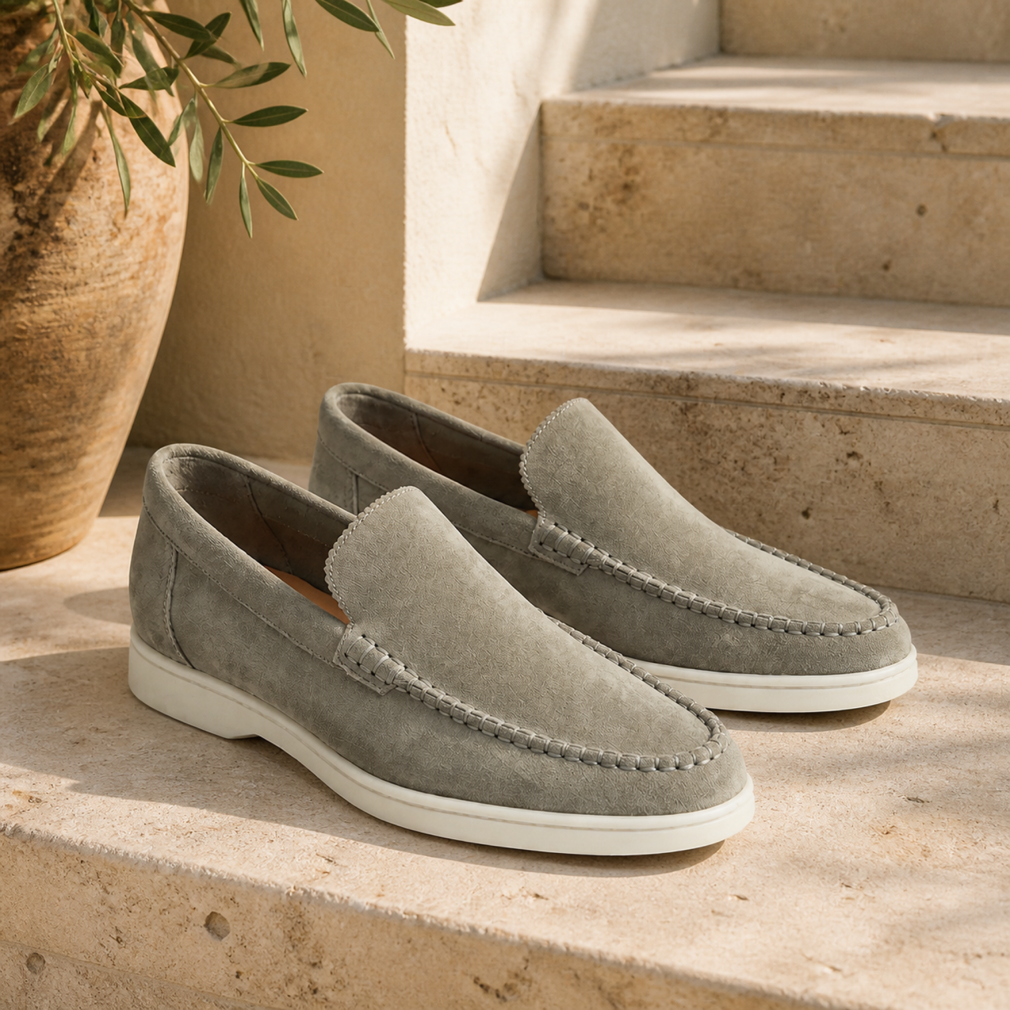 Bellaro stone-pistachio loafers on Mediterranean travertine