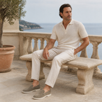 Man wearing Bellaro stone-pistachio loafers on a coastal terrace