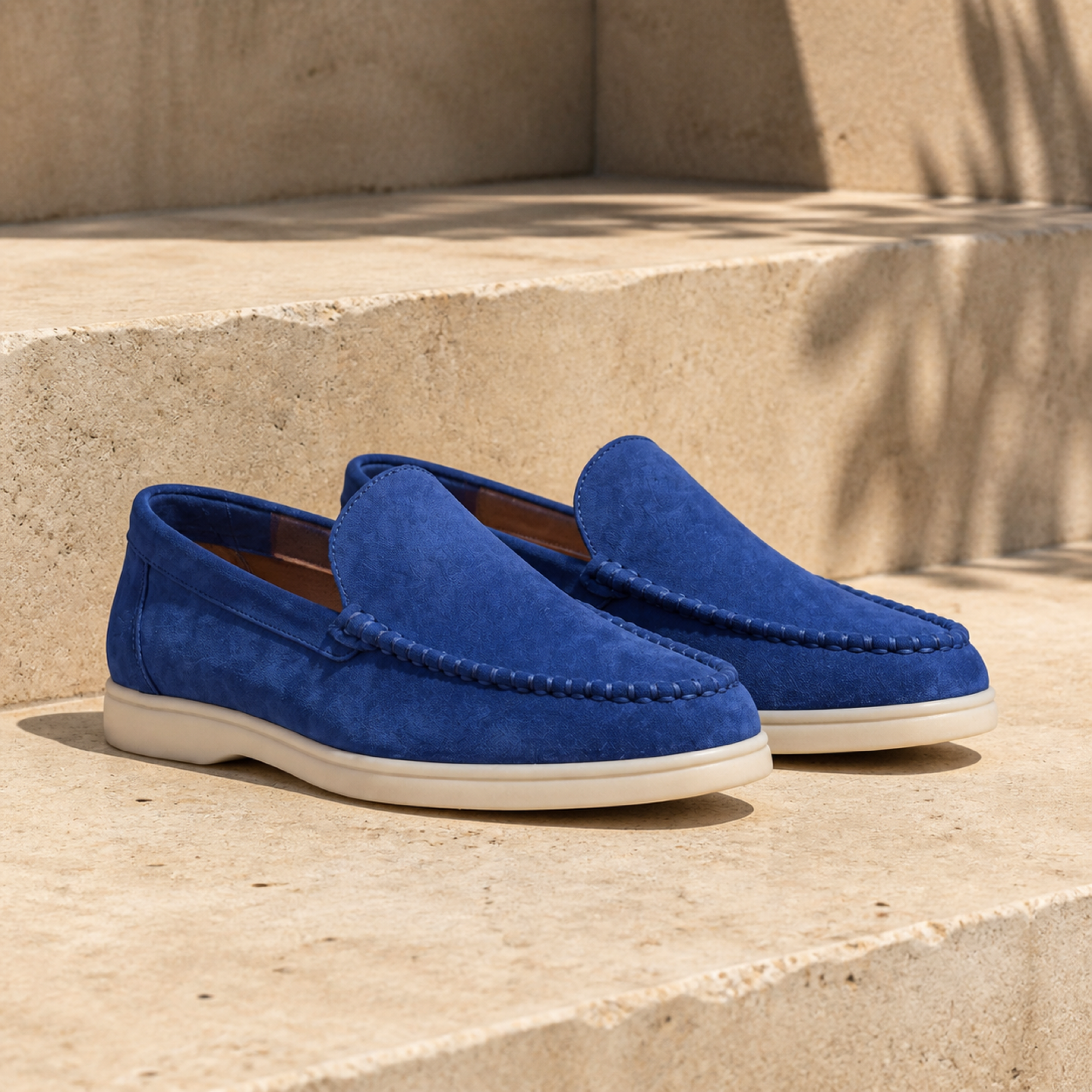 Bellaro Ultramarine loafers — travertine editorial