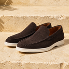 Bellaro warm grey loafers on travertine