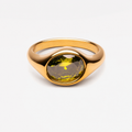 Ivy gold ring with oval olive green stone