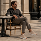 Bruce & Co Caldris beige sneakers at an elegant cafe