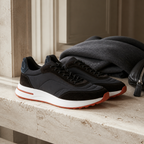 Bruce & Co Caldris black sneakers in a refined still-life editorial