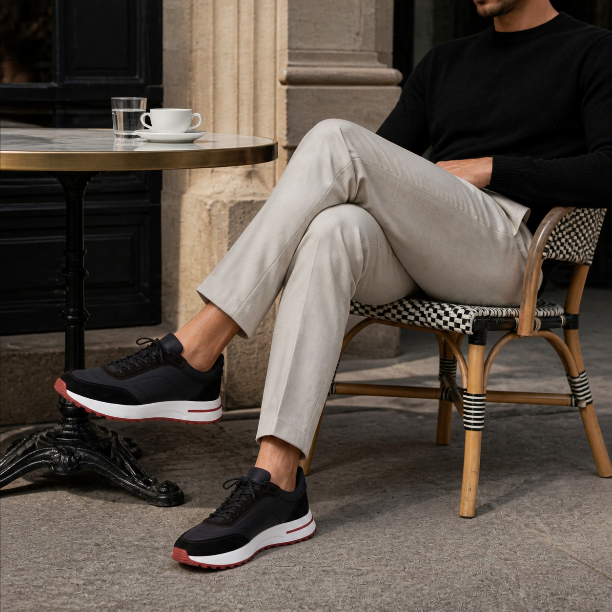 Bruce & Co Caldris black sneakers styled at a European cafe