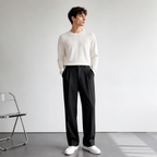 Corvane black tailored trousers minimalist studio styling