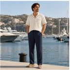 Elmere cream and navy resort set styled beside a marina