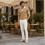 Fiorvello tan knit polo styled at a coastal cafe