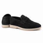 Cormont black penny loafers rear and side construction on white
