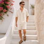 Man wearing the Belvento ivory textured set on Mediterranean stairs