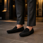Man wearing Averino black penny driver loafers for an evening look
