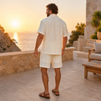 Rear view of the Belvento ivory textured set on a sunset terrace