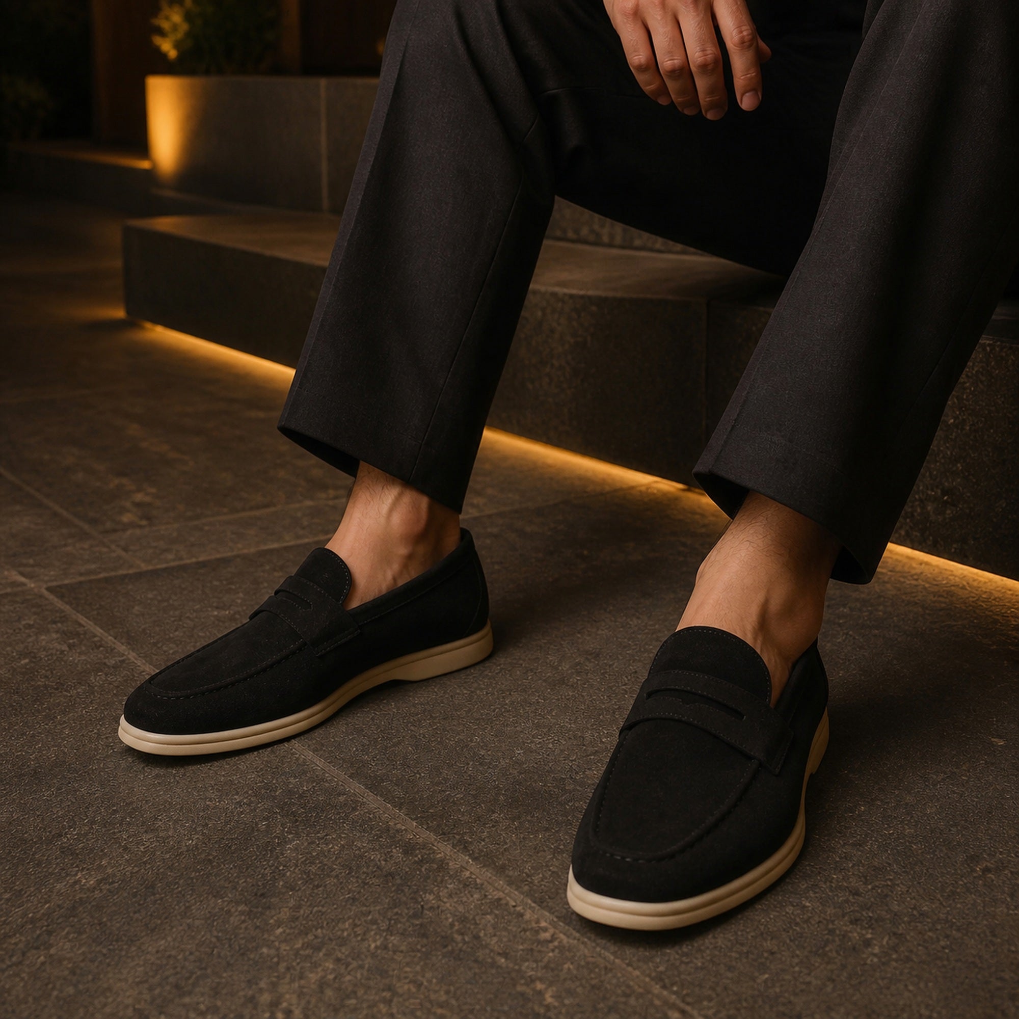 Man wearing Cormont black penny loafers for an evening look