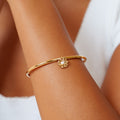 Bruce & Co Isle – Freshwater Pearl Charm Bangle, Gold PVD Steel