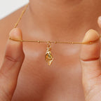 Bruce & Co Hand Pendant Necklace with Green Zircon