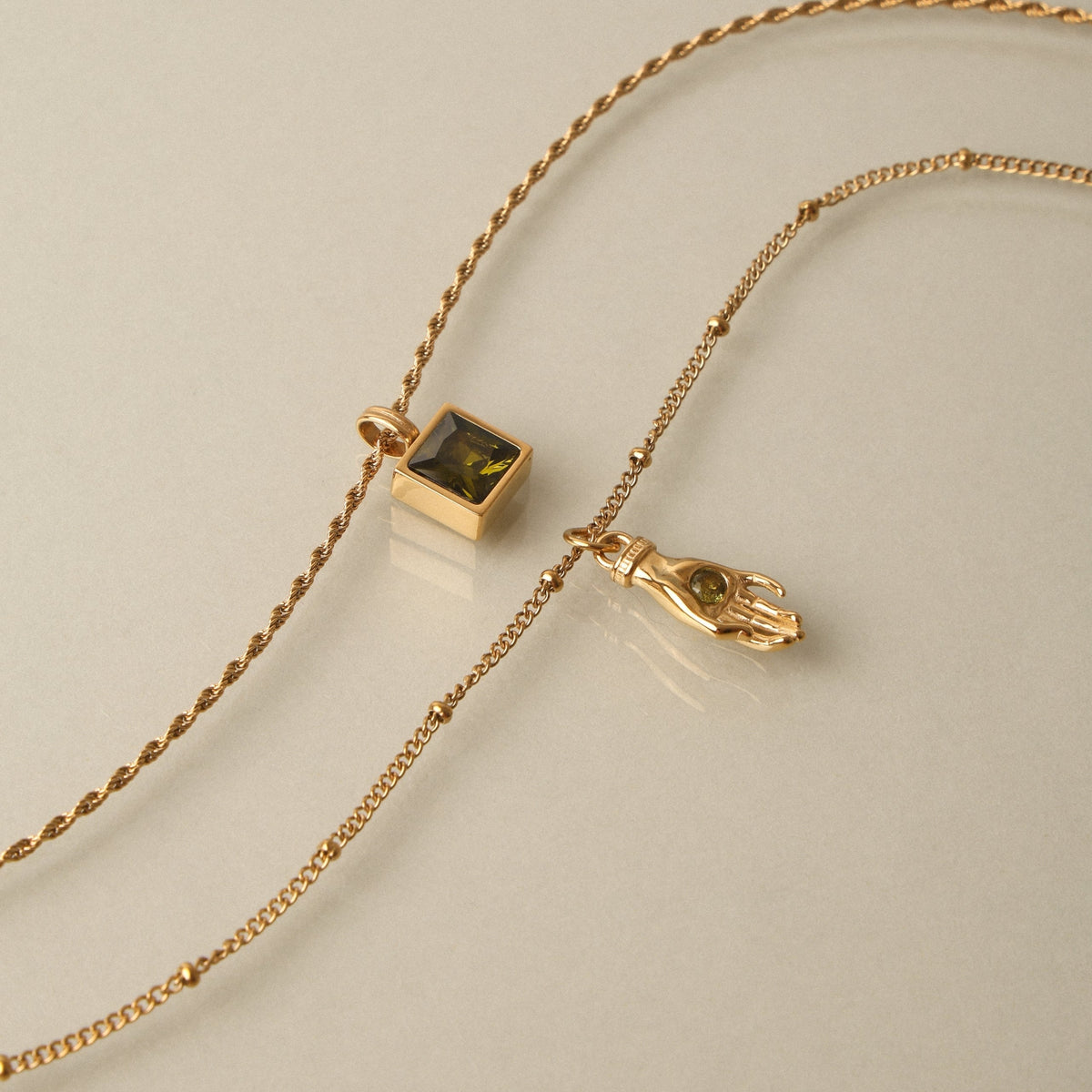 Bruce & Co Hand Pendant Necklace with Green Zircon