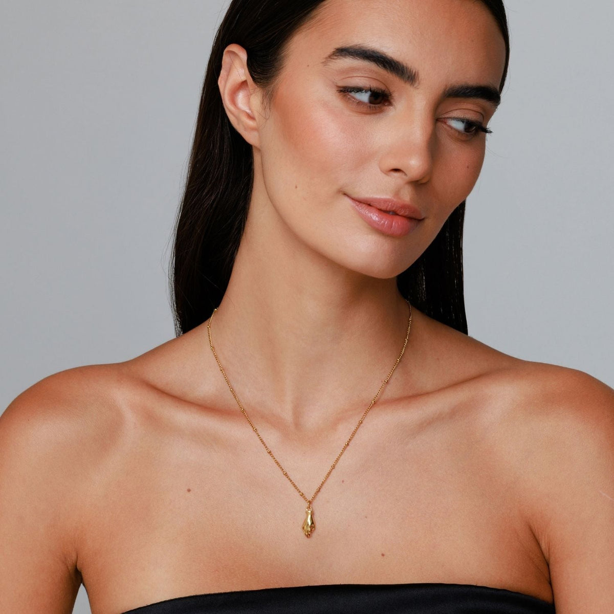 Bruce & Co Hand Pendant Necklace with Green Zircon