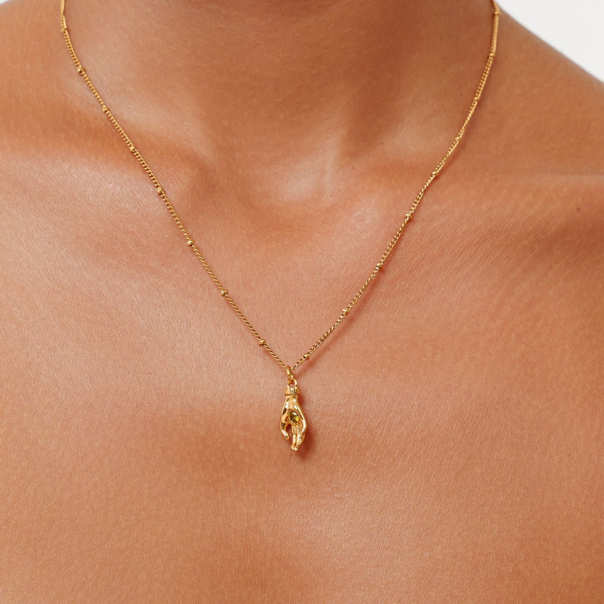 Bruce & Co Hand Pendant Necklace with Green Zircon