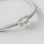 Bruce & Co Infinity Knot Bracelet, Platinum-Plated Steel, Adjustable