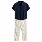 Ivelian navy shirt and off-white trousers outfit set, front studio view