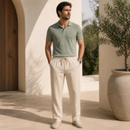 Ivemont beige linen trousers styled at a Mediterranean villa