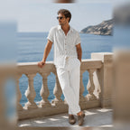 Kalemere white outfit styled on a seaside terrace