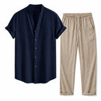 Kalerel navy mandarin-collar shirt and tan drawstring trousers, studio view