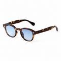 Bruce & Co BUENOS AIRES leopard frame blue lens angled view on pure white