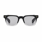 Bruce & Co MEDELLIN Black clear frame grey lens front on pure white background