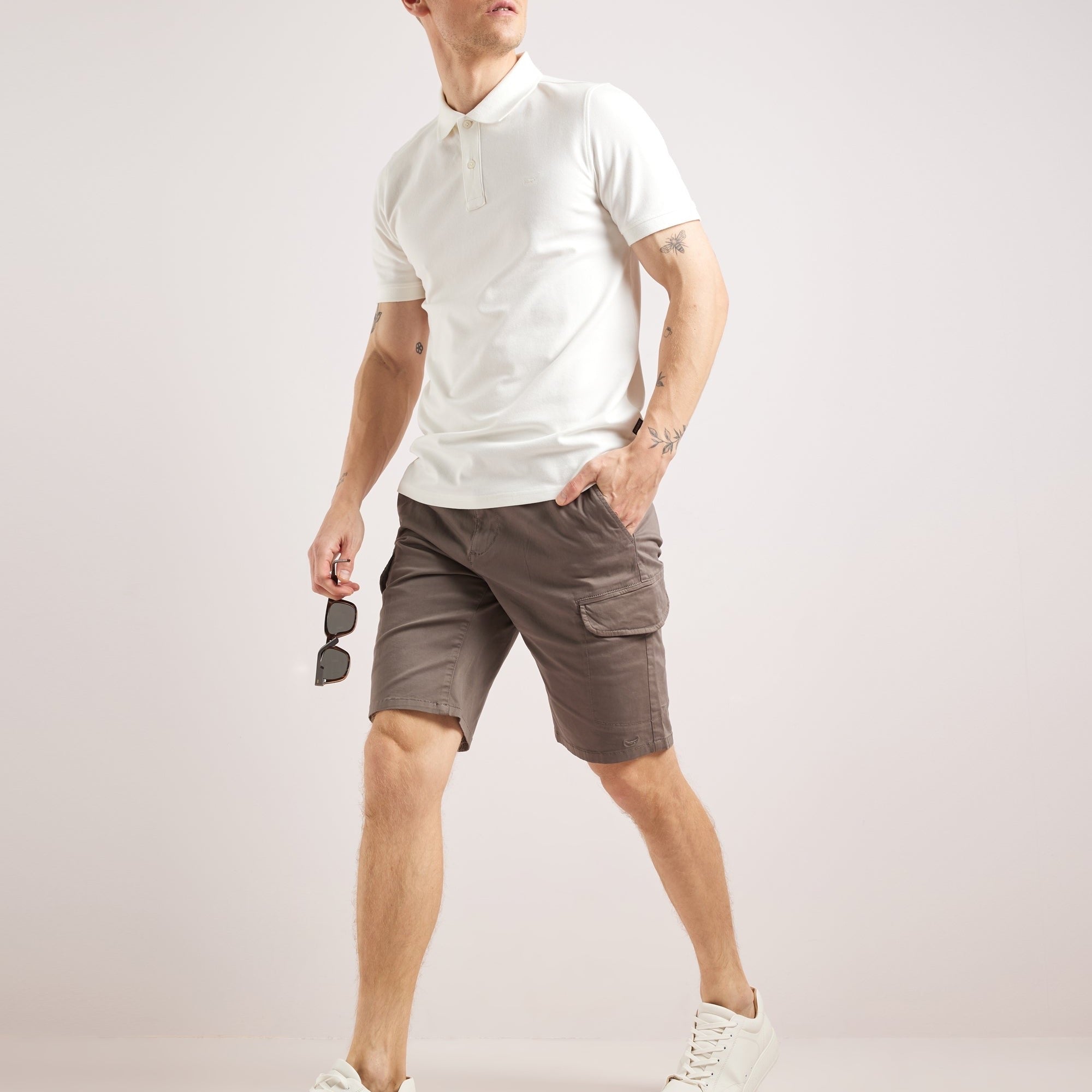 Men wearing Bruce & Co gray cargo shorts