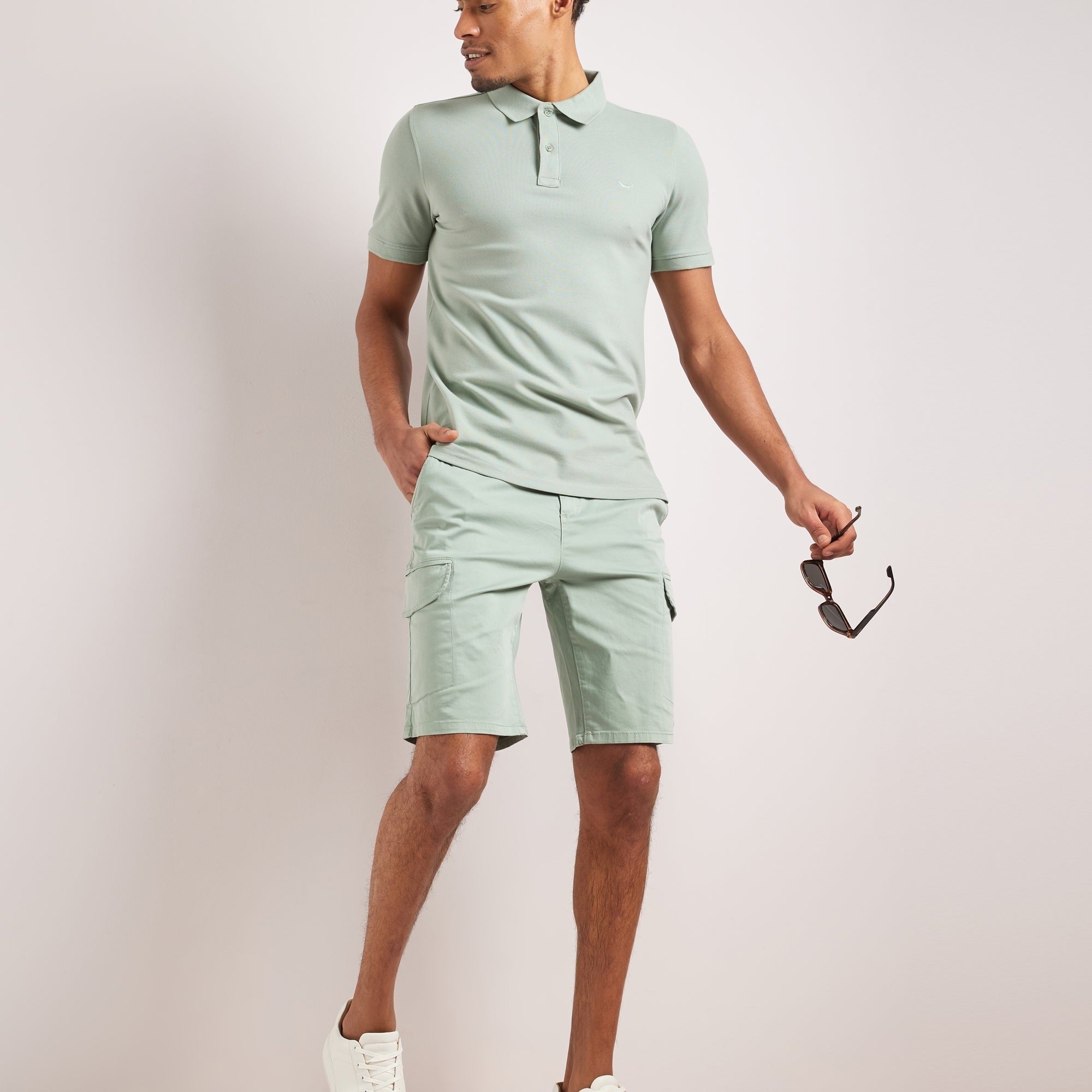Men wearing Bruce & Co mint green cargo shorts