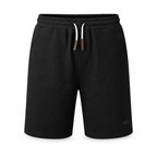 Men's black waffle-textured casual shorts, front view