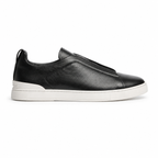 Bruce & Co Norvane black slip-on sneakers side view