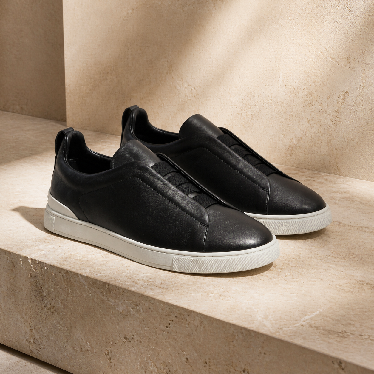 Bruce & Co Norvane black slip-on sneakers still life