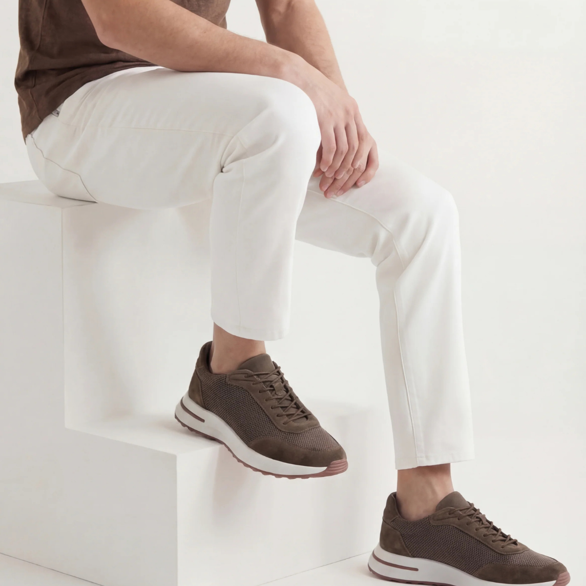 Bruce & Co Orvessa brown mesh sneakers styled with cream trousers