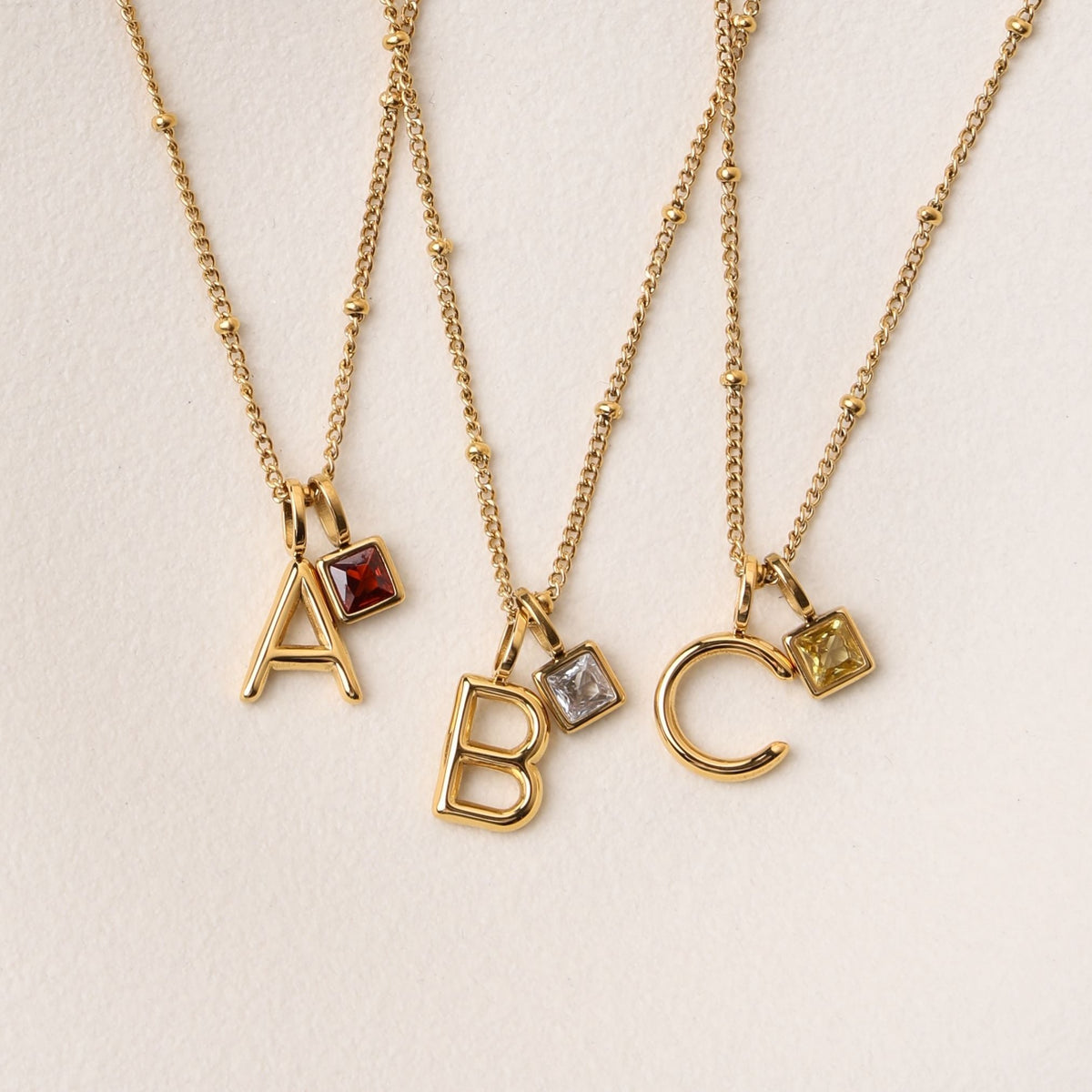 Bruce & Co Initial & Birthstone Charm Necklace