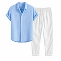 Lorvaro blue shirt and white trousers studio front view