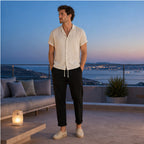 Lorvaro beige and black set on an evening rooftop