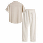 Lorvello ecru pinstripe shirt and ivory trousers set, rear ghost mannequin view