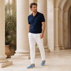 Marivon sapphire-blue boat loafers in a Mediterranean colonnade